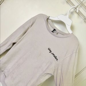 “ stay positive “ cursive sweater